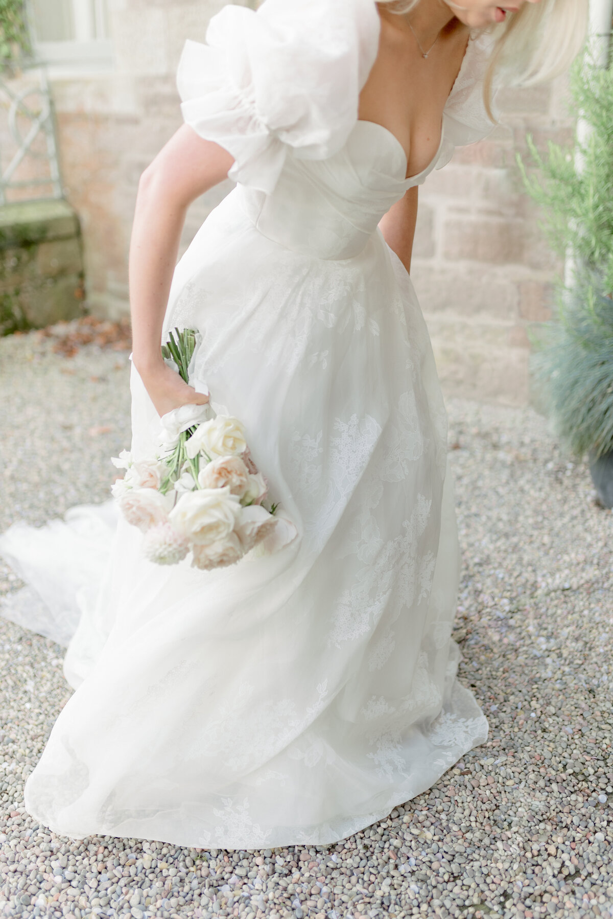 Bride outside the Chapel of Cromlix House, Scotland, with pale pink peony bouquet by Lavender and Rose Events photographed by fine art wedding photographer UK, Jill Cherry Porter.