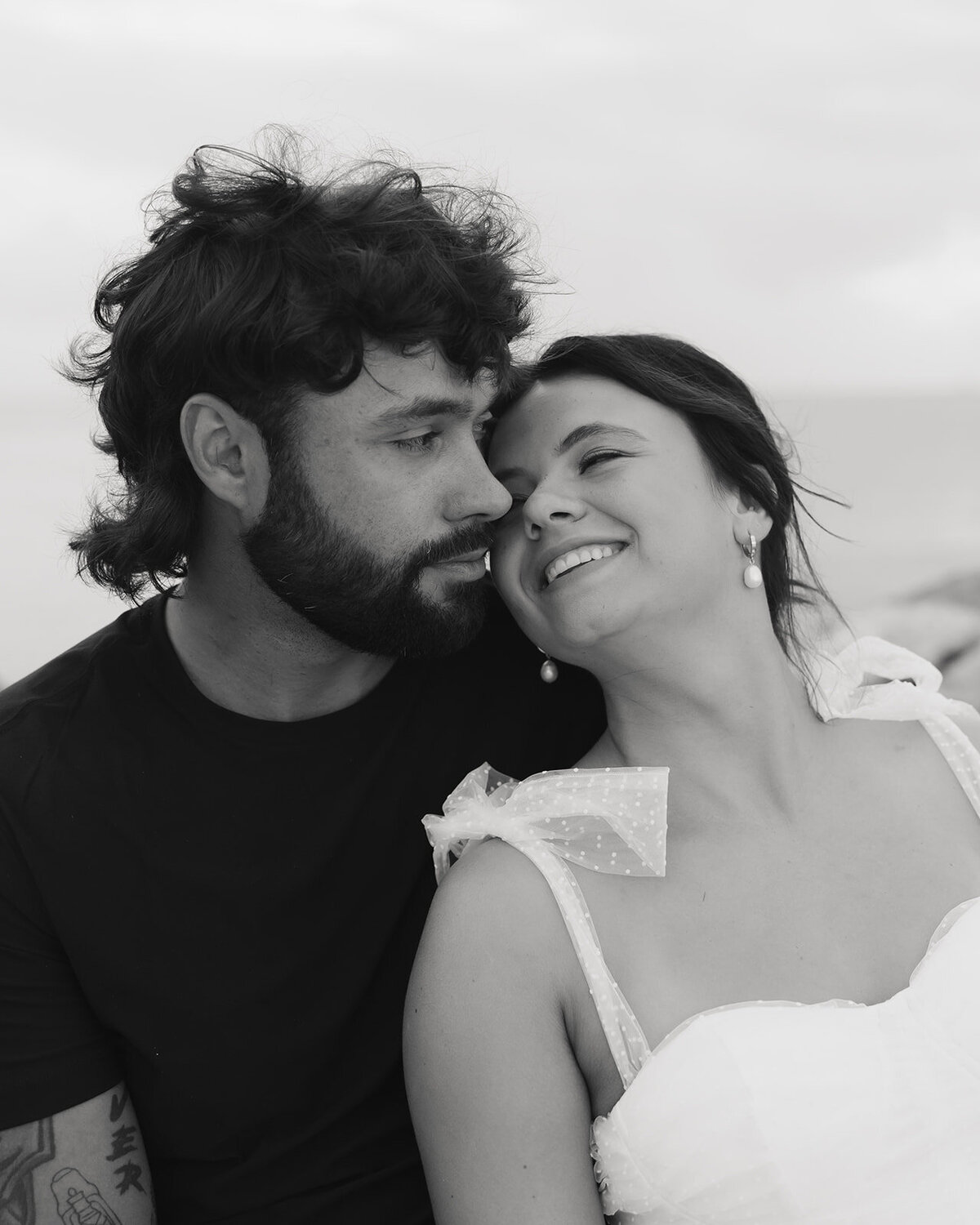 man and woman smile