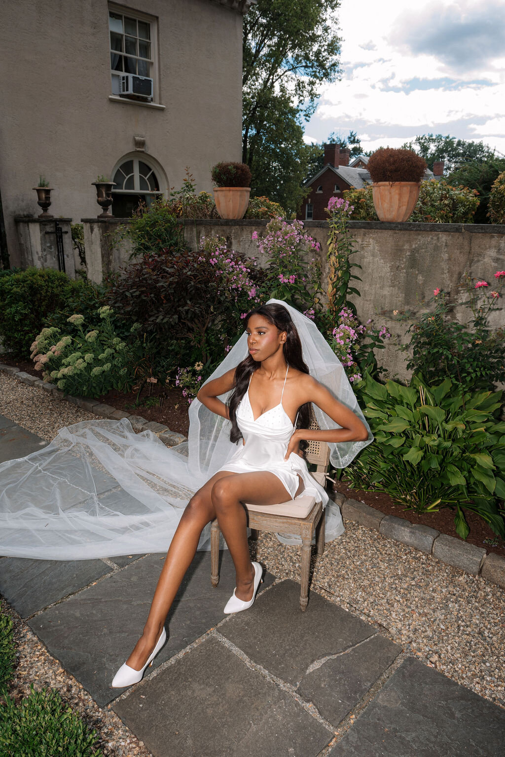 Buttery satin slip gown adorned with fine beadwork and elegant straps
