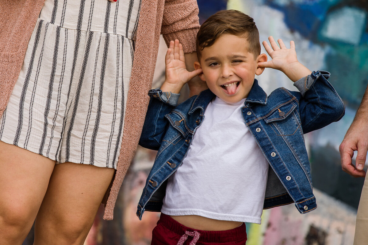 A kid enjoying a bold and elegant mini session with Fox & Brazen in Phoenixville.
