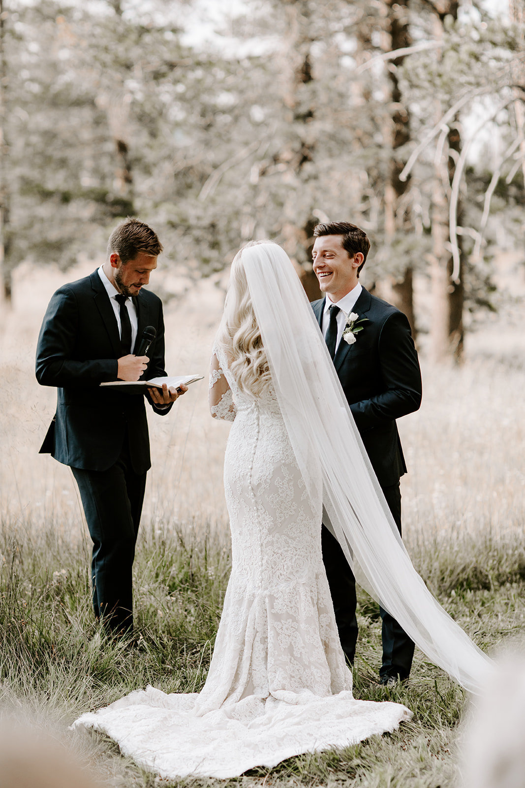 Truckee Wedding Planners couple saying vows in meadow at venue Mitchell's Mountain Meadows Sierraville near Truckee, Joy of Life Events image by The Shepard Photography