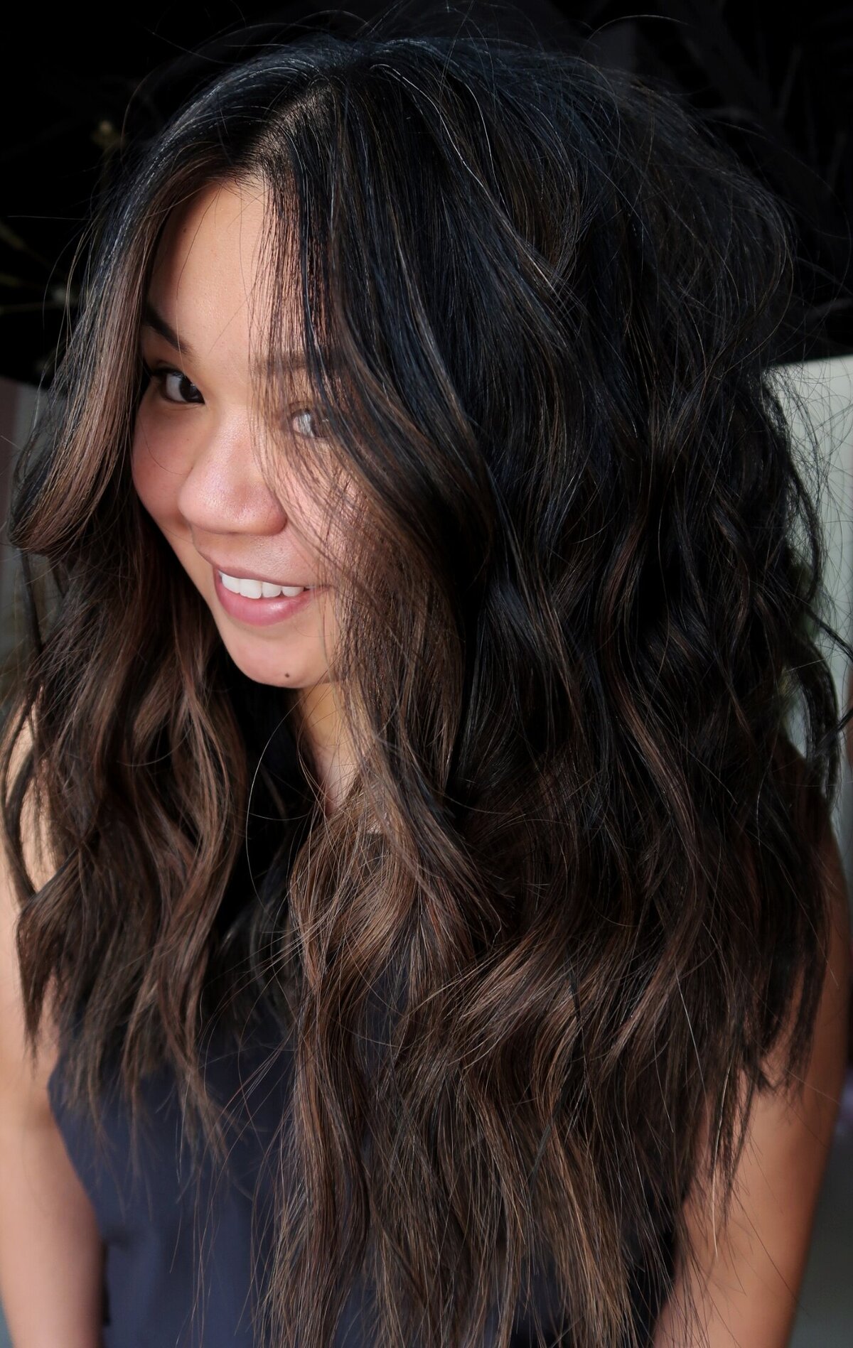 A gorgeous dark chocolate brunette balayage by Moxie by KC in Kansas City