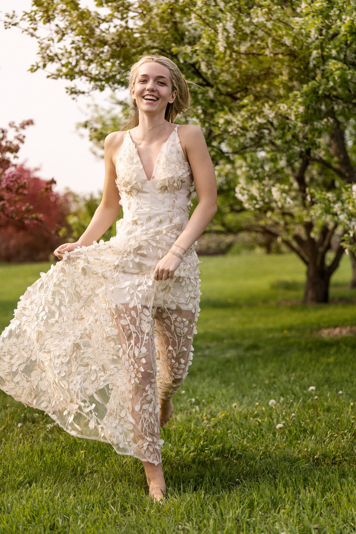 Minnetrista Minnesota high school senior  photo of girl in prom dress in  park