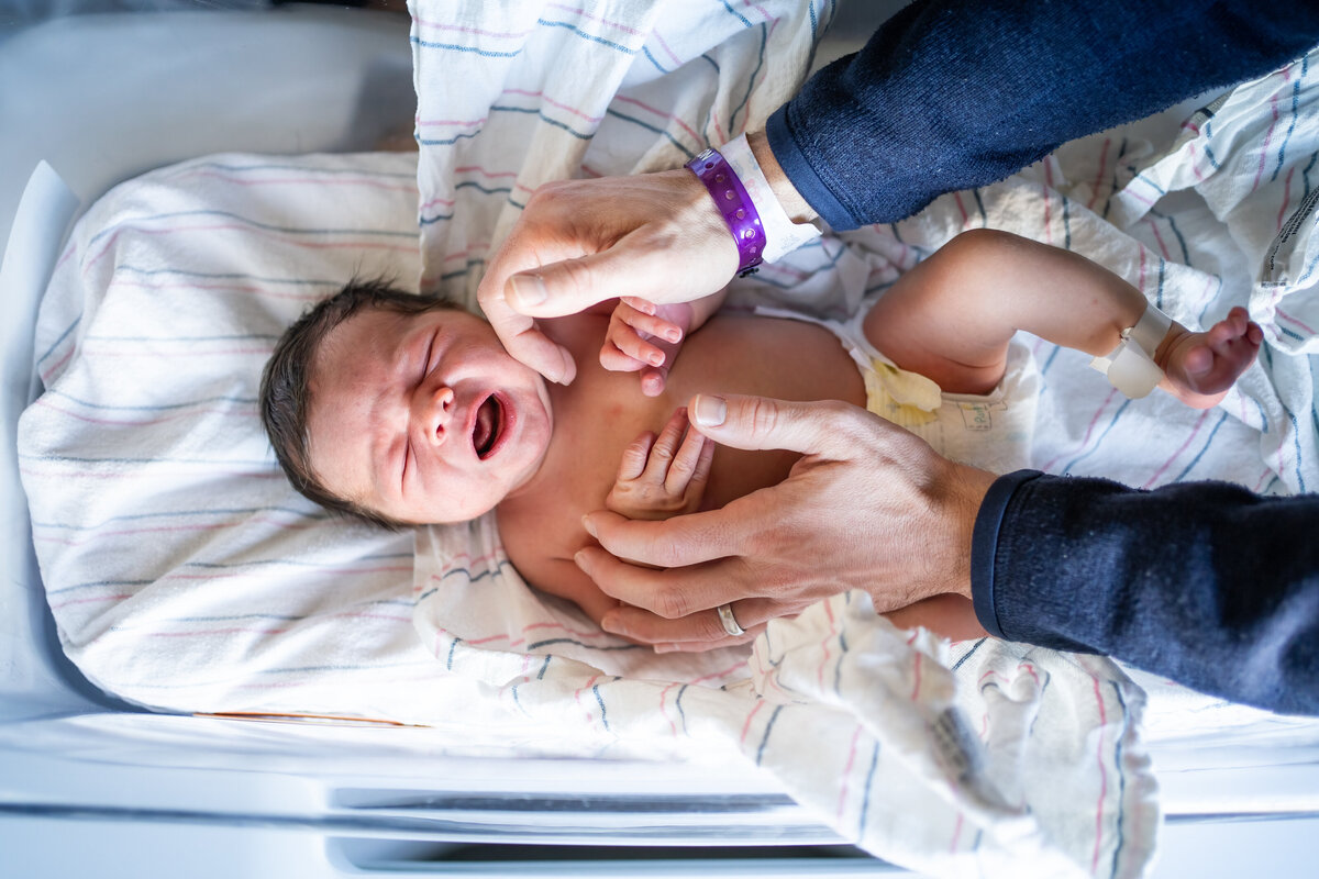 Crying newborn baby from bird's eye view