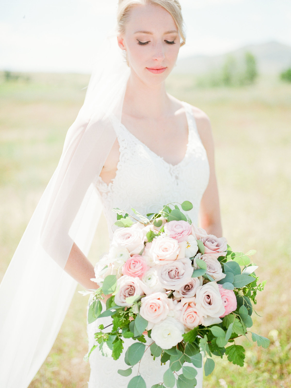 A collection of wedding photography highlights showcases the most memorable moments of the bride and groom's special day. The images capture a variety of scenes: the bride and groom sharing their first kiss, exchanging vows, and walking hand-in-hand down the aisle. There are close-up shots of their wedding rings, the intricate details of the bridal bouquet, and candid moments of laughter and joy among family and friends. The gallery includes a mix of black-and-white and color photographs, each framed beautifully to highlight the emotions and significance of the day. Soft, warm lighting in the images enhances the romantic atmosphere, making each moment feel timeless and full of love.