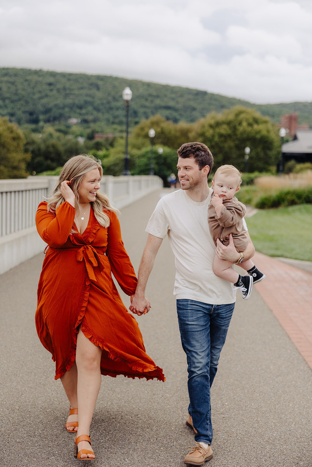 Couple holding their one year old at a family session