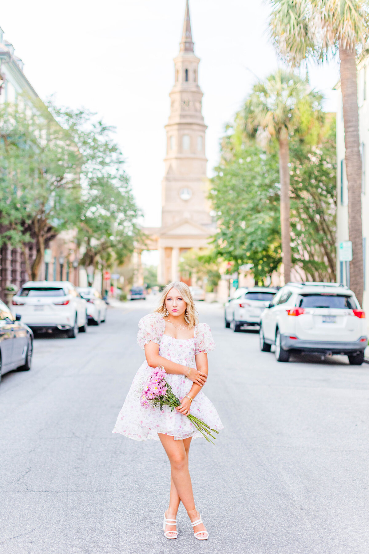senior pictures in charleston, south carolina with chapel in the background