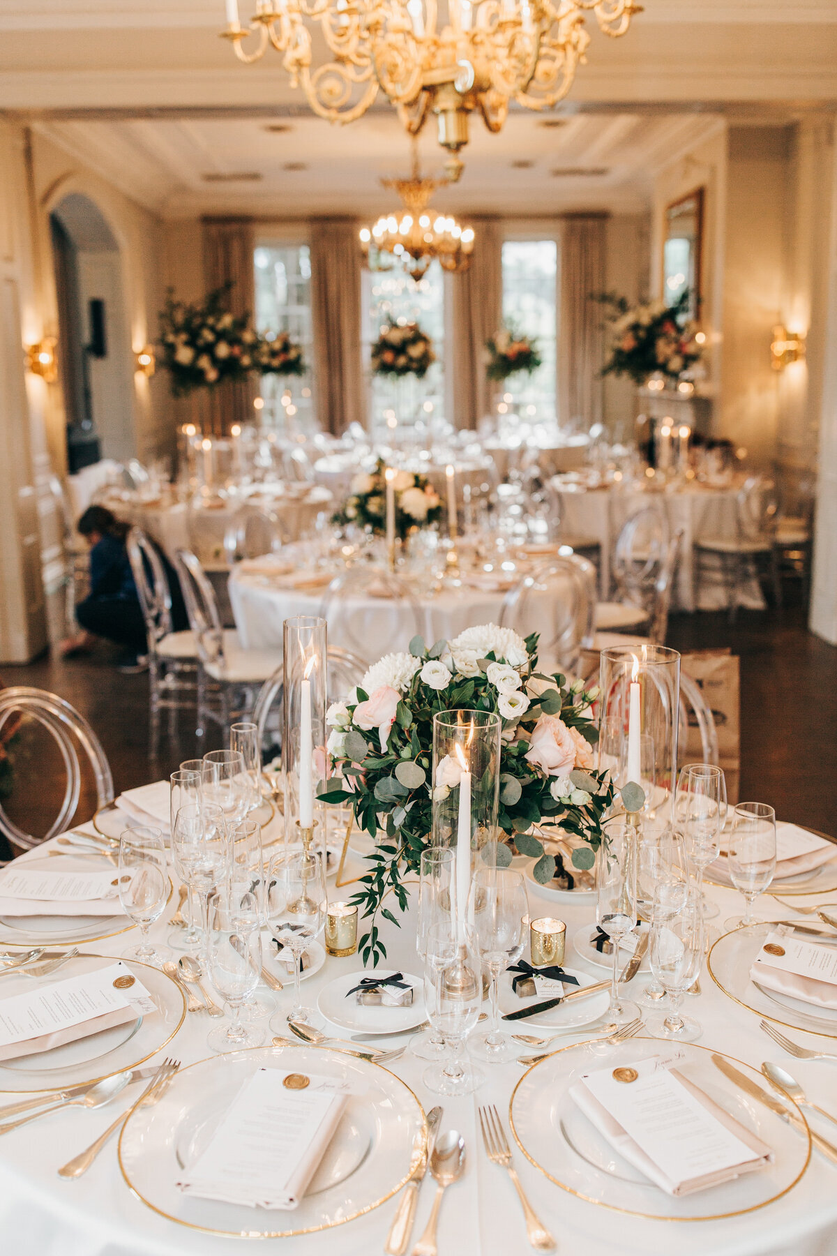 Luxurious wedding dinner with candlesticks and floral centre pieces