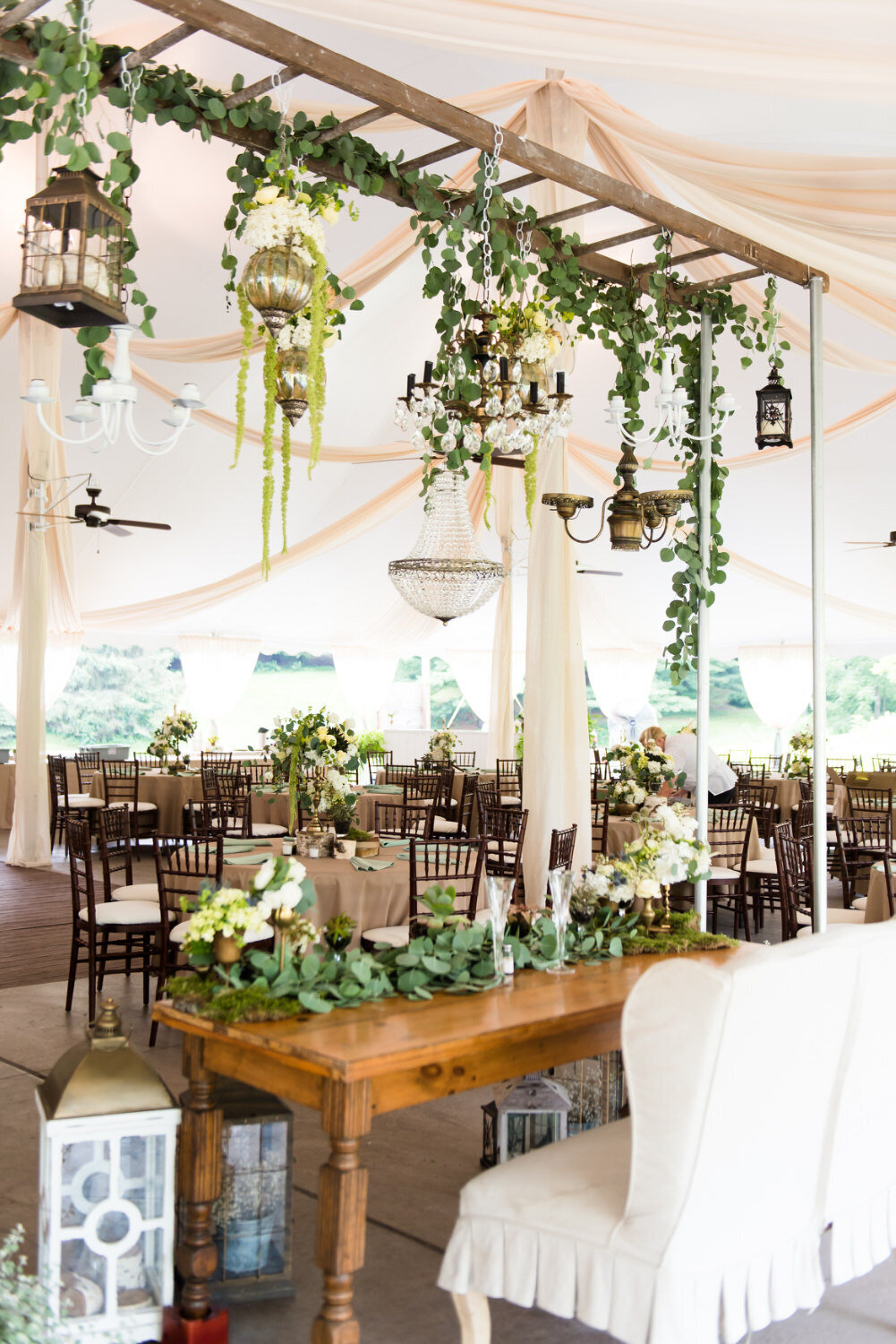 wedding reception setup inside of tent at shady elms farm