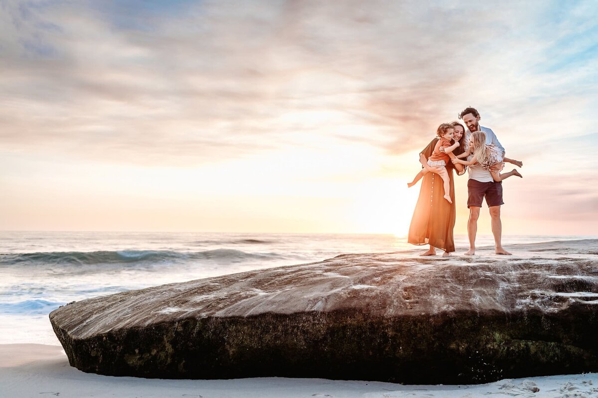 San Diego Family Photographer captures family at beach during golden hour sunset