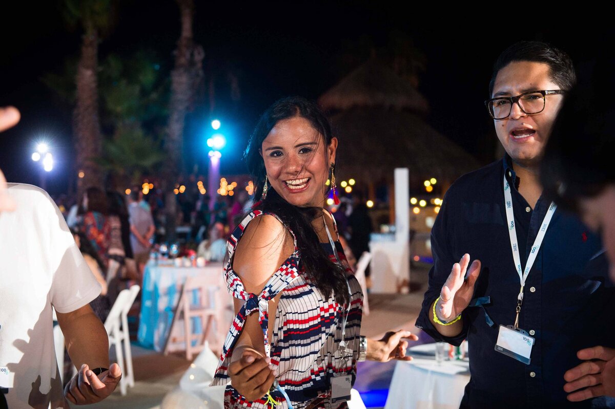 Women dances at a destination corporate event