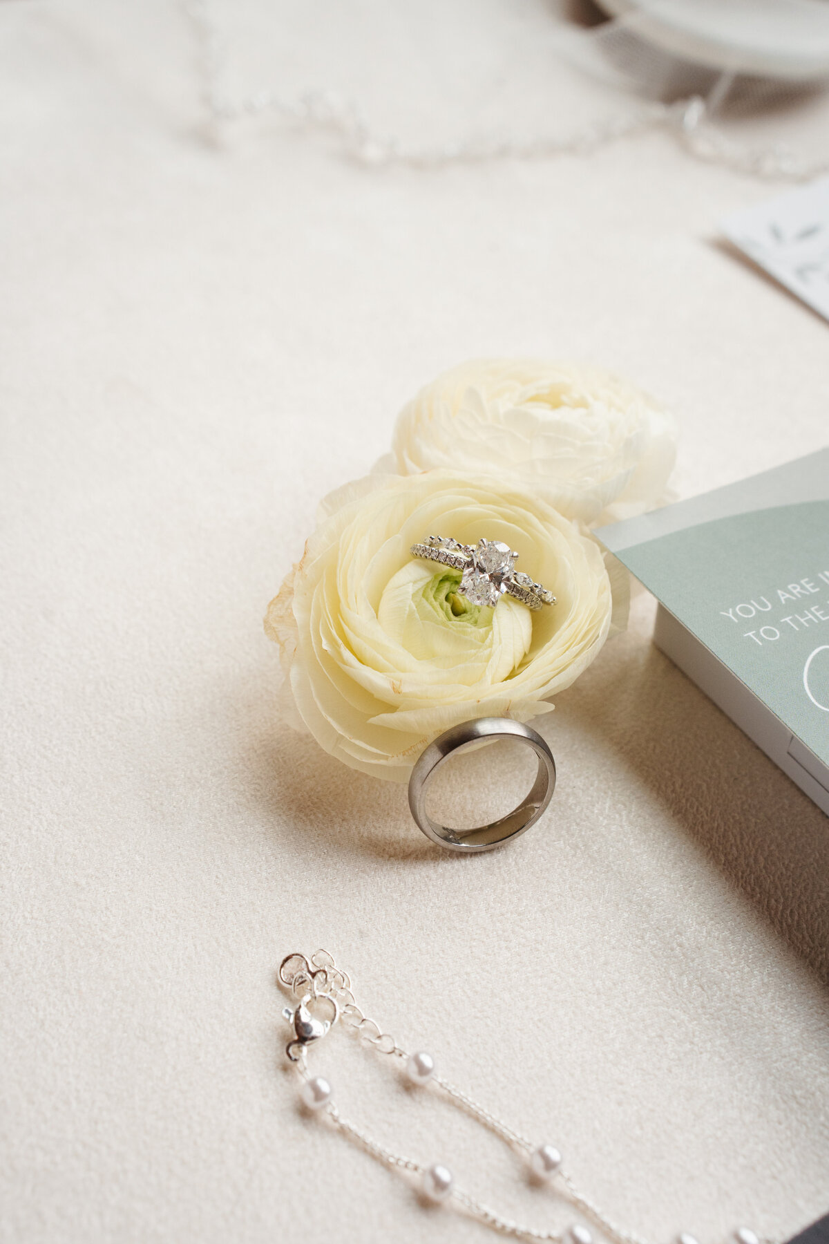 Rustic wedding details with greenery and neutral tones