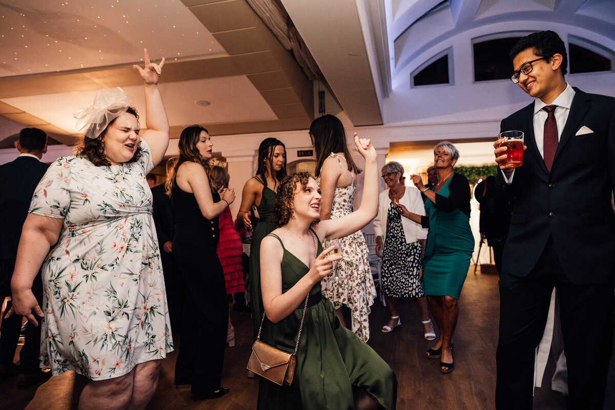 Wedding guest dancing at a reception
