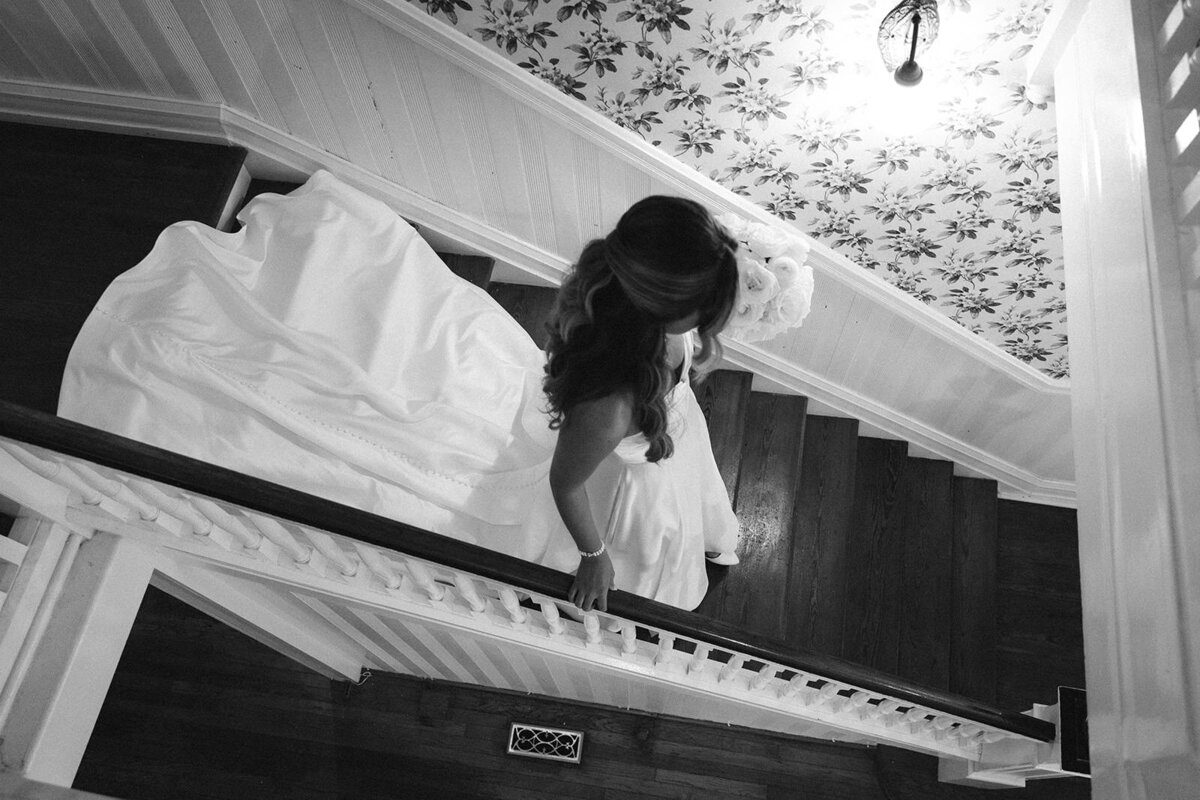 bride-walks-down-stairs-dramatic-photo