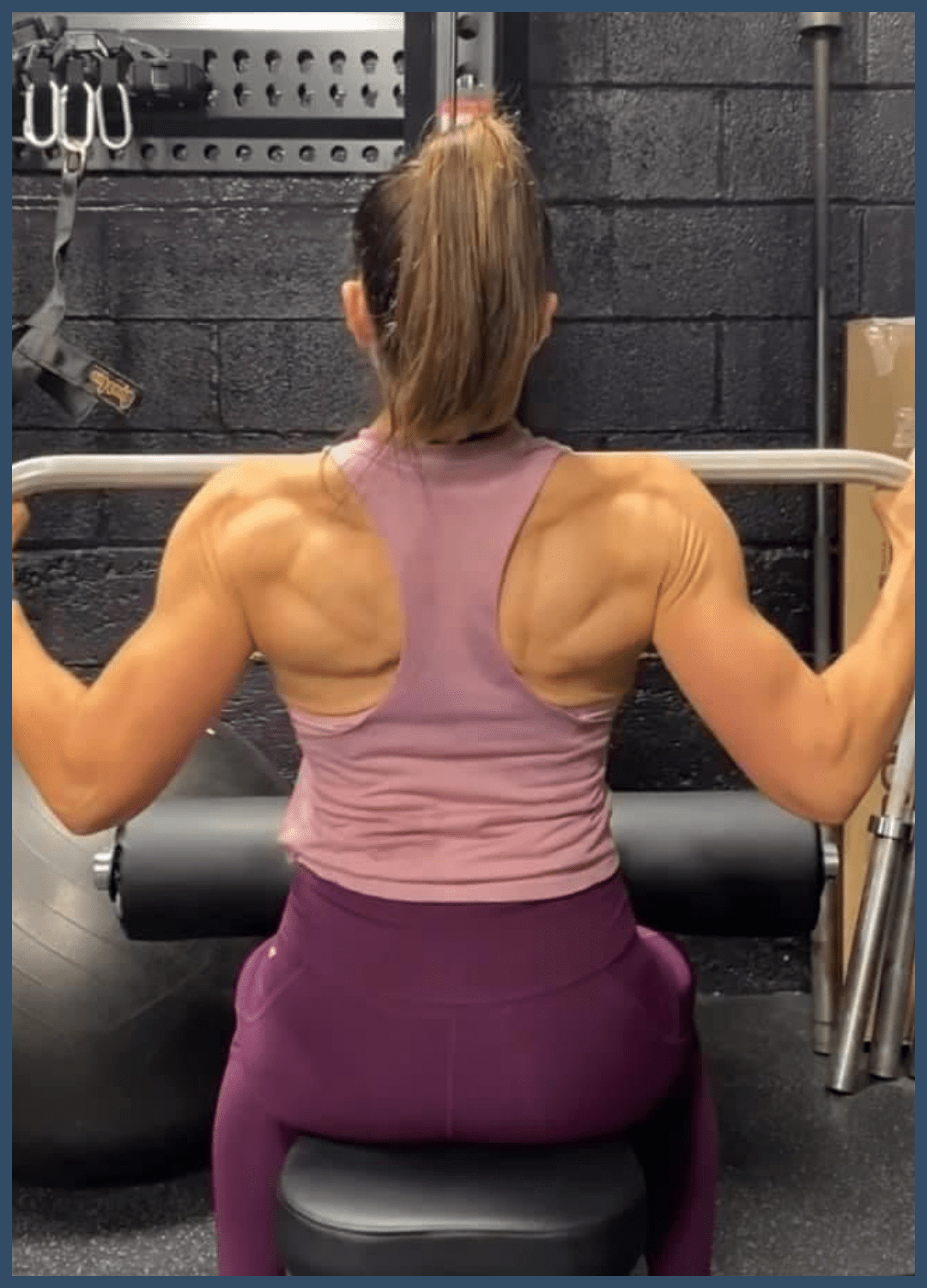 Client doing lat pulldowns