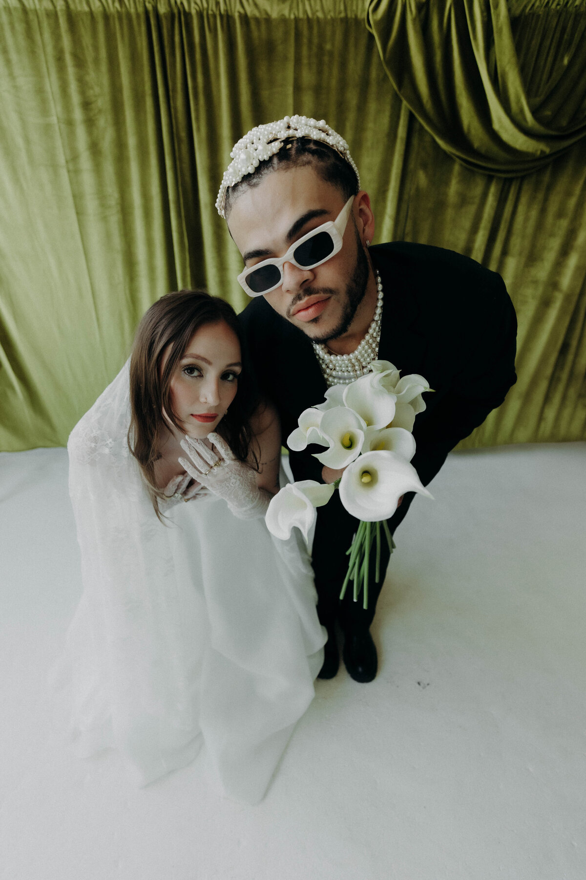 editorial untraditional wedding photography A$AP ROCKY pearl hair clips calla lily bouquet green velvet backdrop