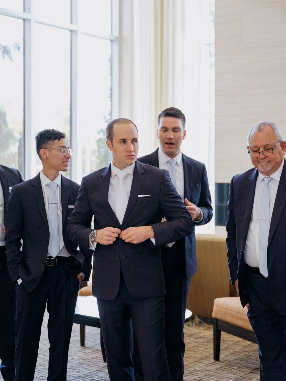 Groom getting ready at private estate wedding