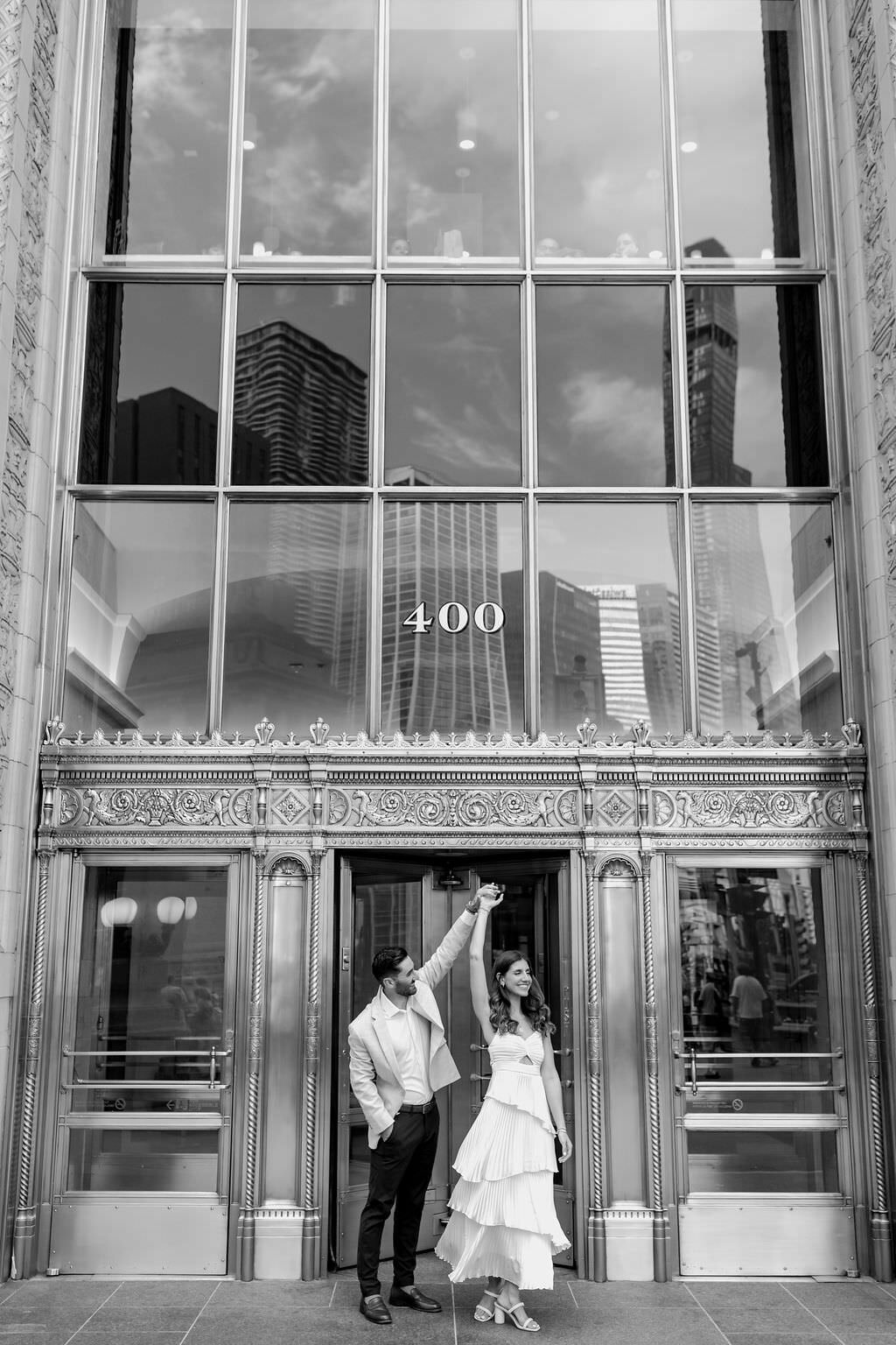 An engagement photography session at The Wrigley Building and North Ave Beach in Chicago, Illinois - 8