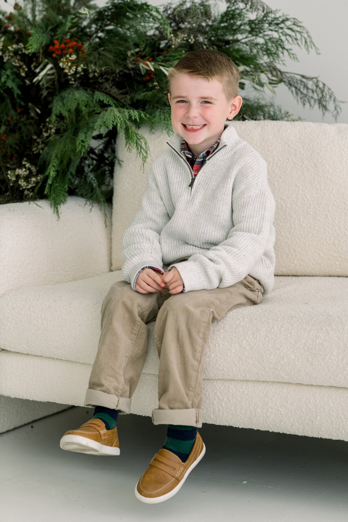 Christmas portrait of young boy by Nicole DeTone Photography.