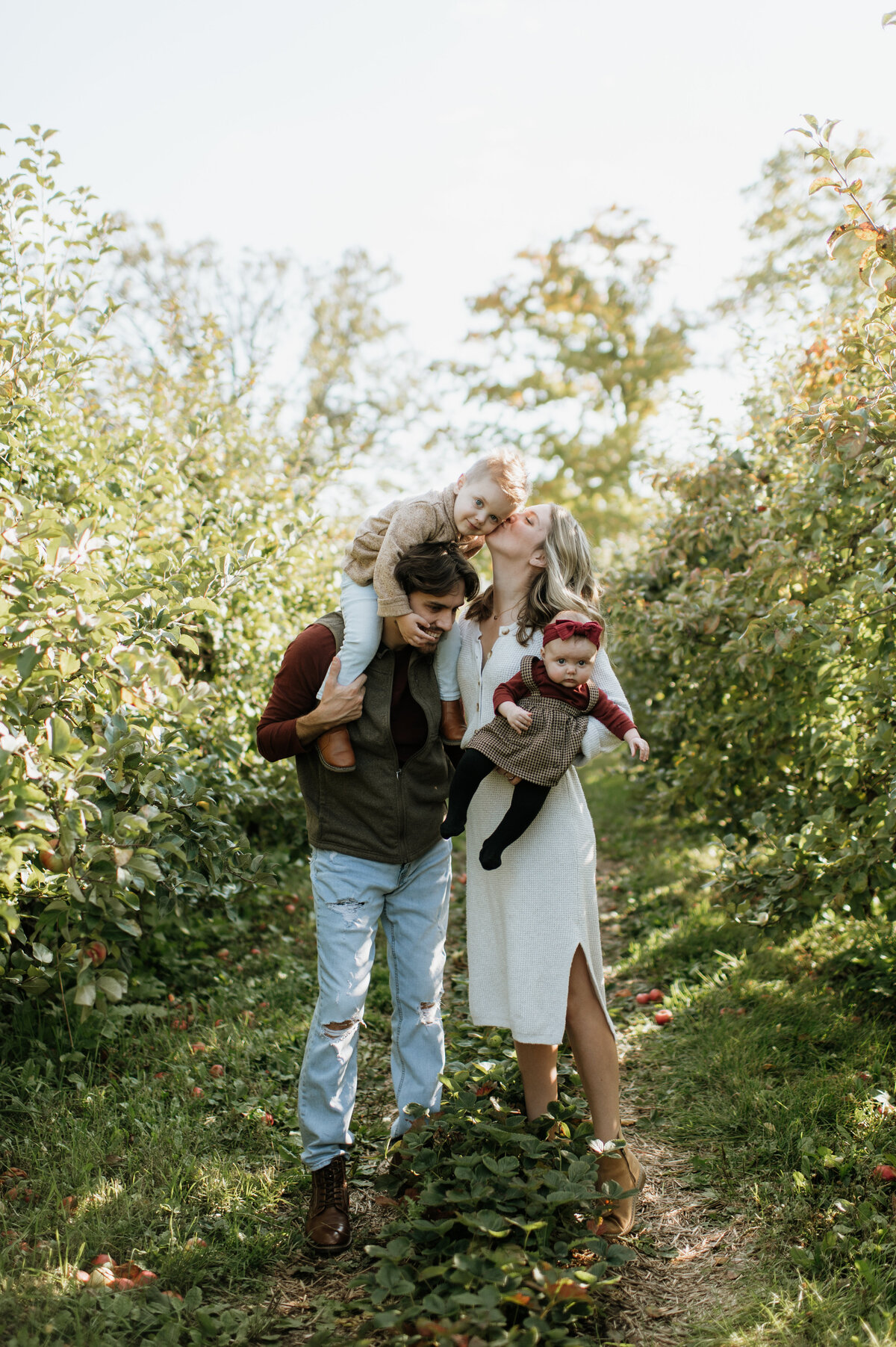 Family photo in forest during fall in South Bend.