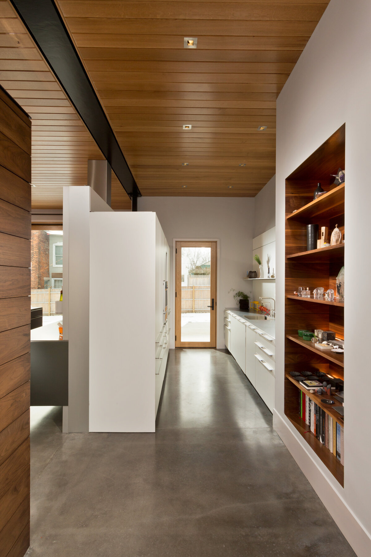 kitchen hallway with pantry and organic elements