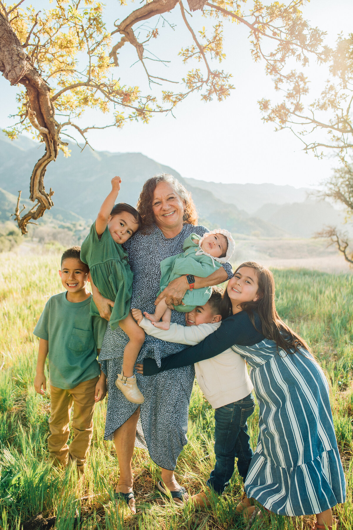 Family Portrait Photo Of Kids Hugging An Older Woman Los Angeles