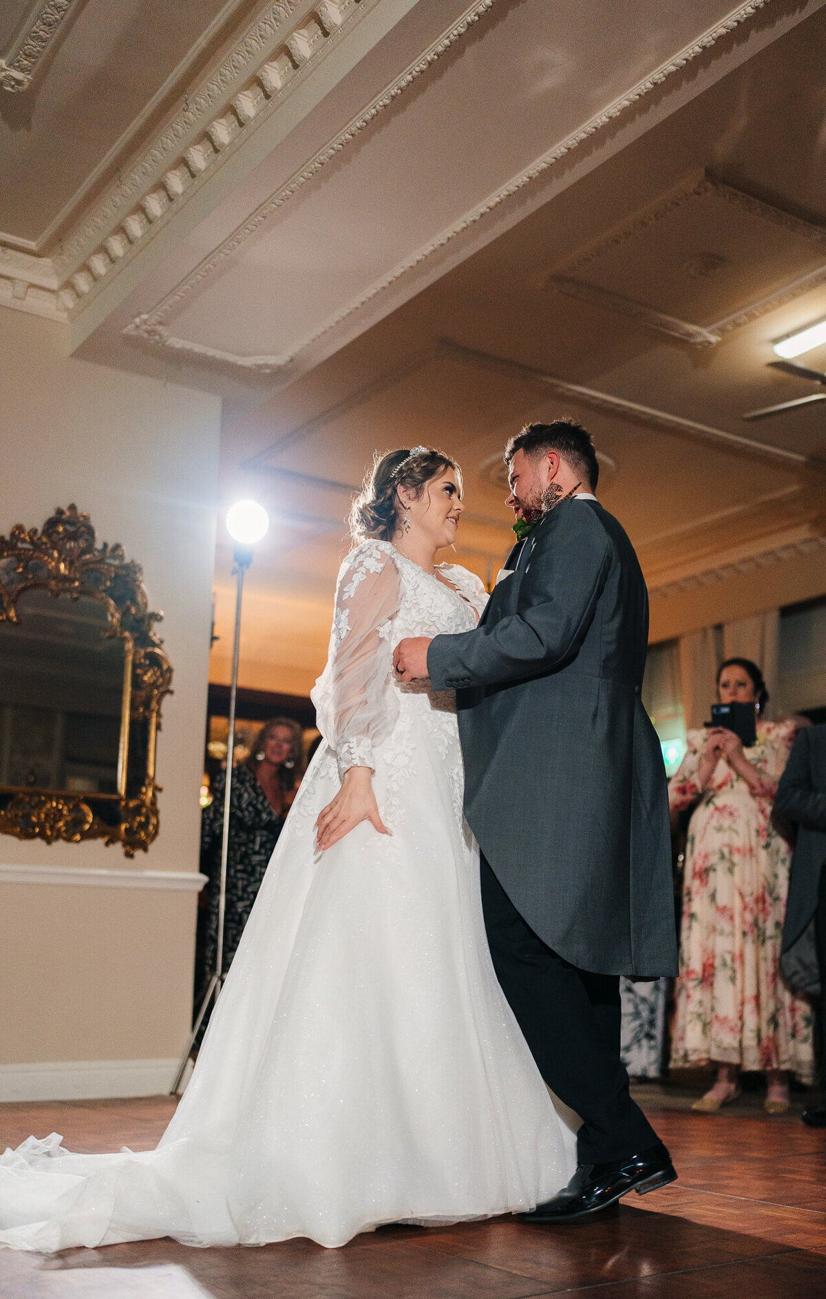 Bride and groom during first dance  at Merewood  Country House Hotel  taken by wedding videographer and photographer Anthony Horseman