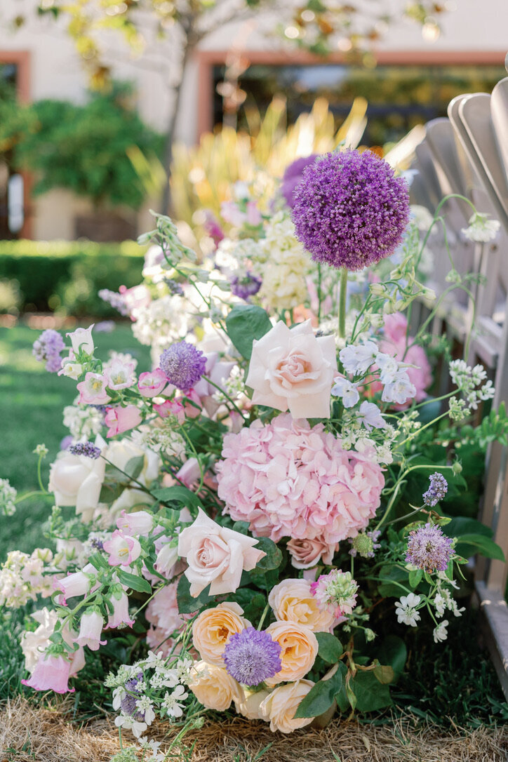 beginning of aisle arrangements, paste. flowers,