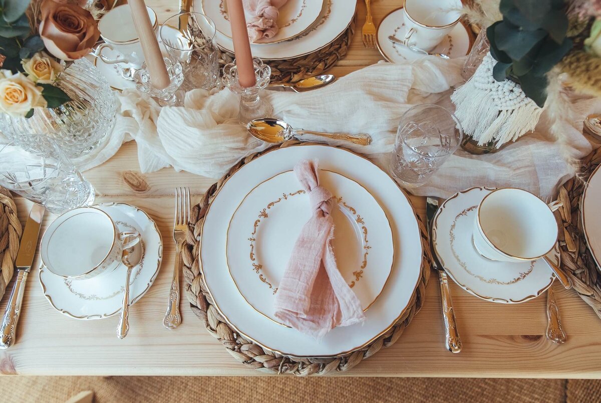 Blush table setting for afternoon tea with vintage chinaware