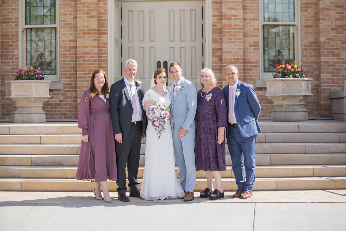 a wedding party in purple and blue