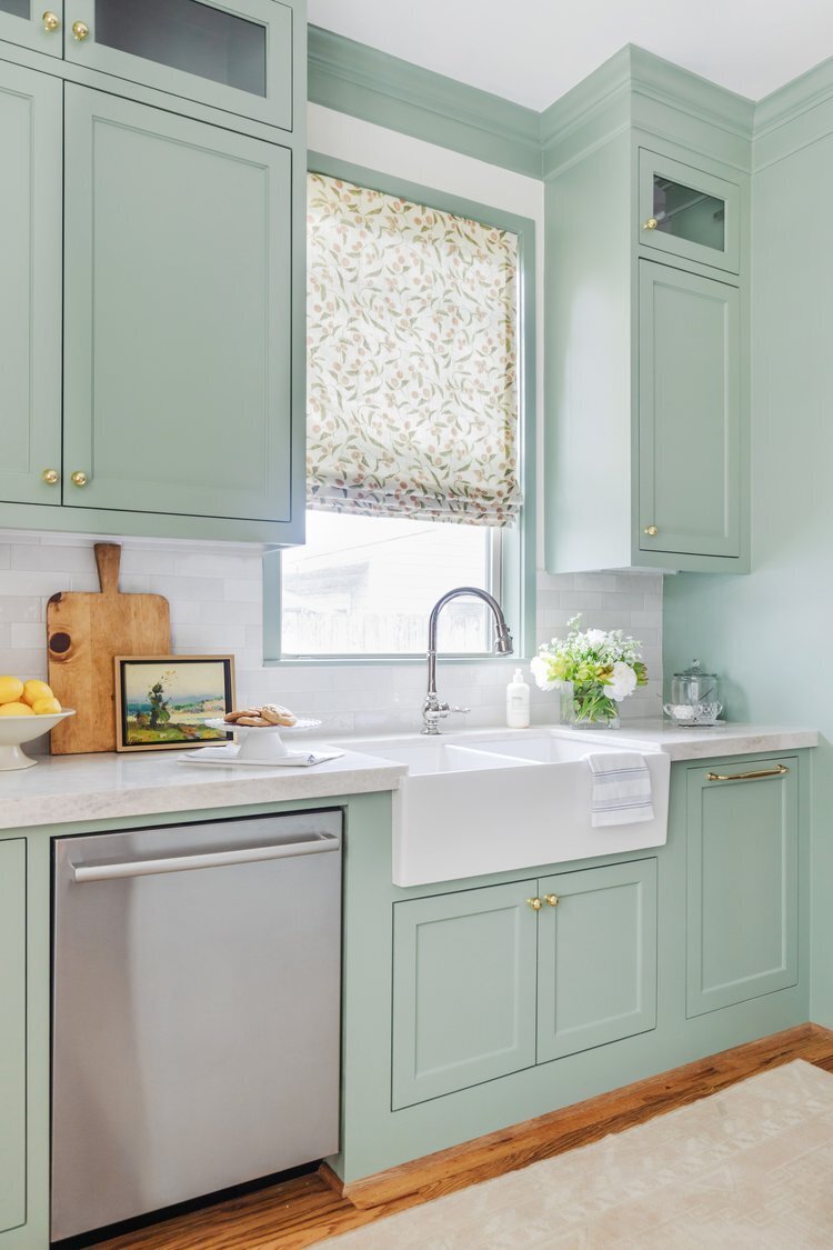 oyster creek studios oak forest remodel light green kitchen vabinets with stainless steel dishwasher in kitchen
