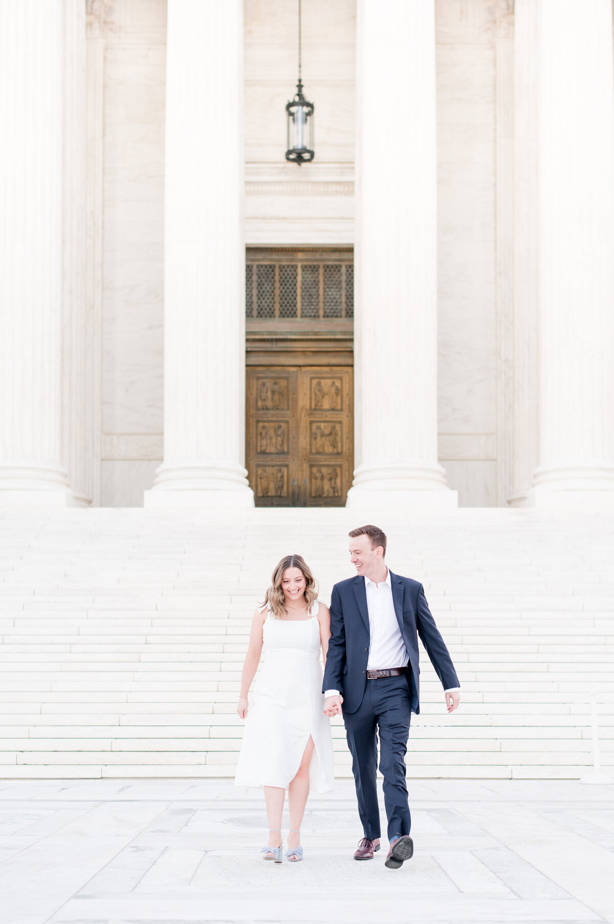 couple engagement at supreme court steps