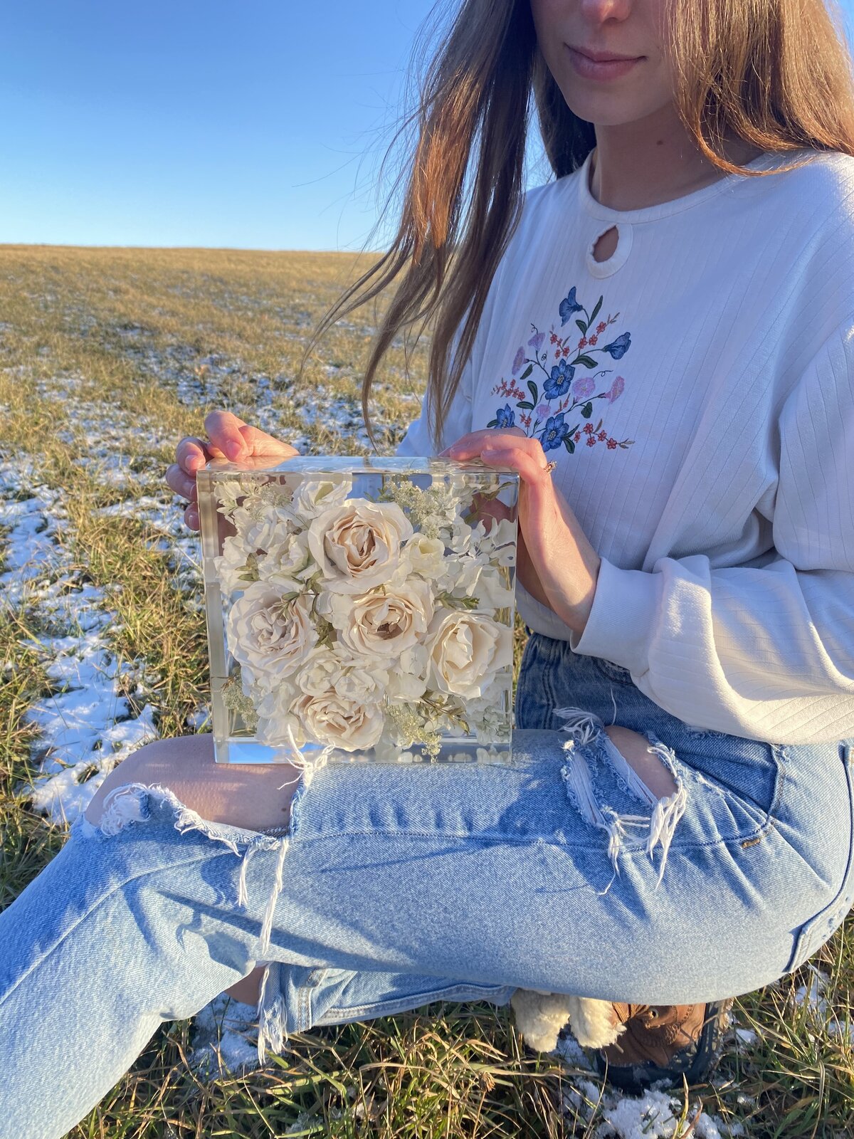 White wedding bouquet preserved in resin