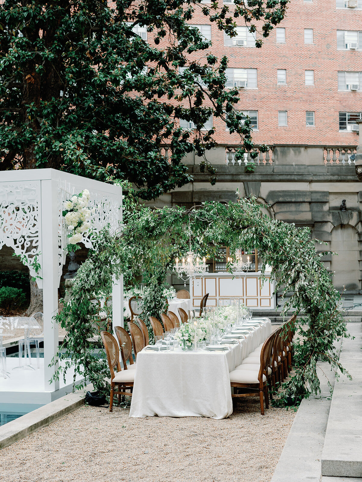 Wedding with lush green and cream decor