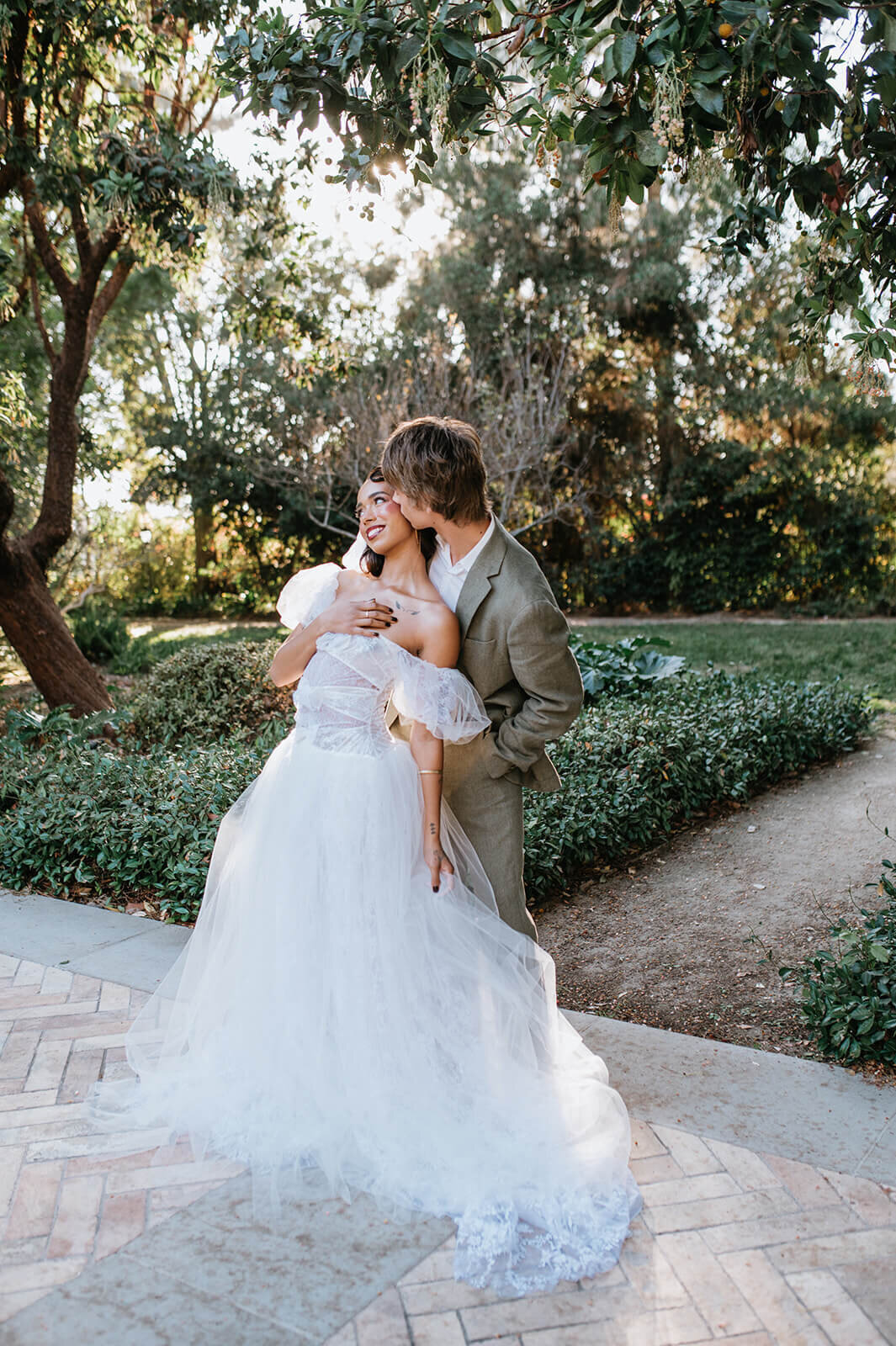 Groom-kisses-bride