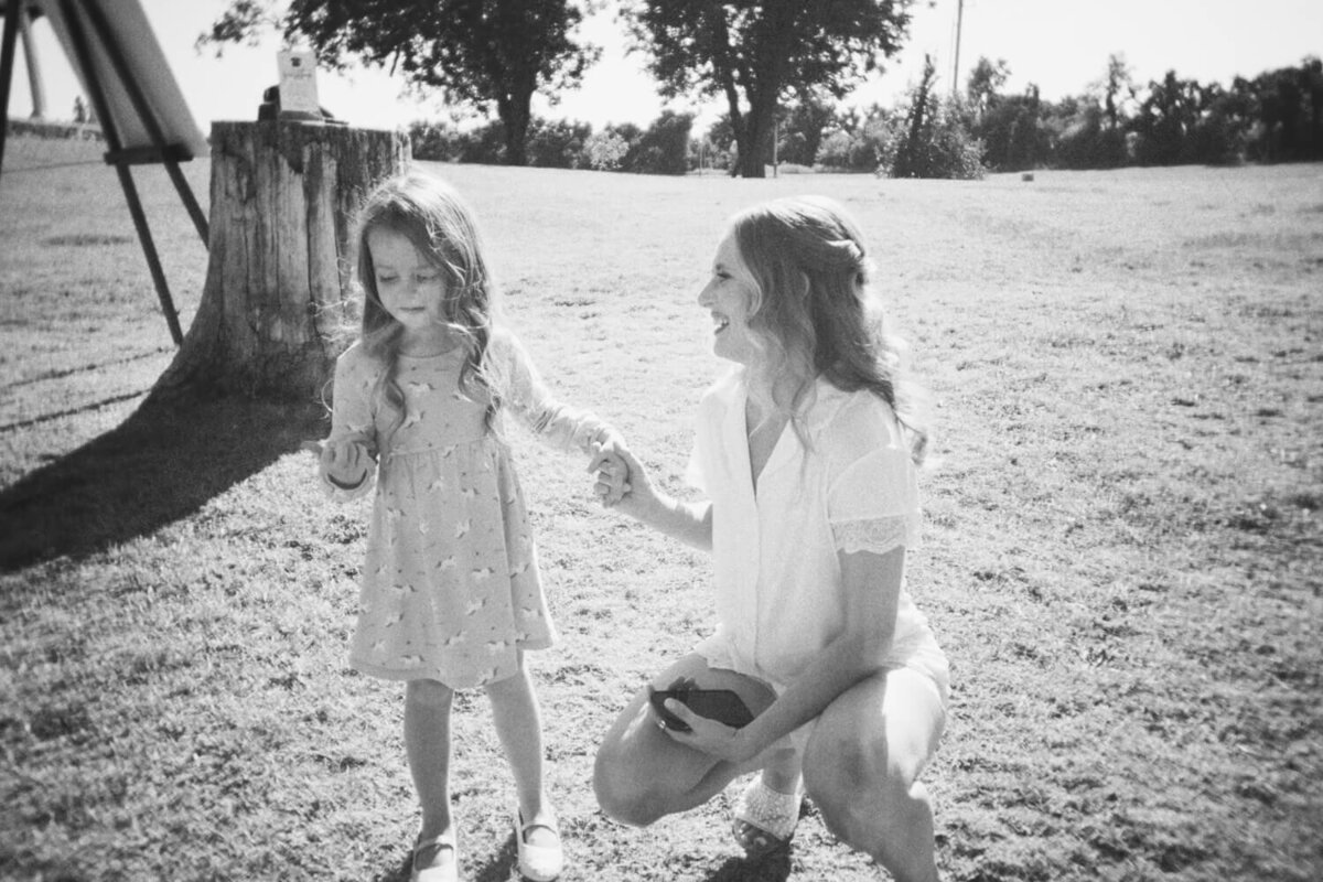 bride-and-niece-holding-hands