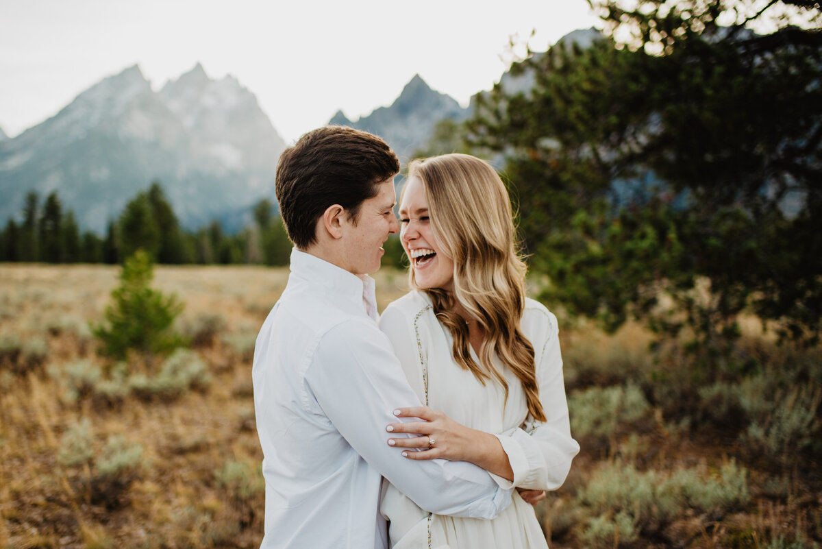 Photographers Jackson Hole capture couple laughing together