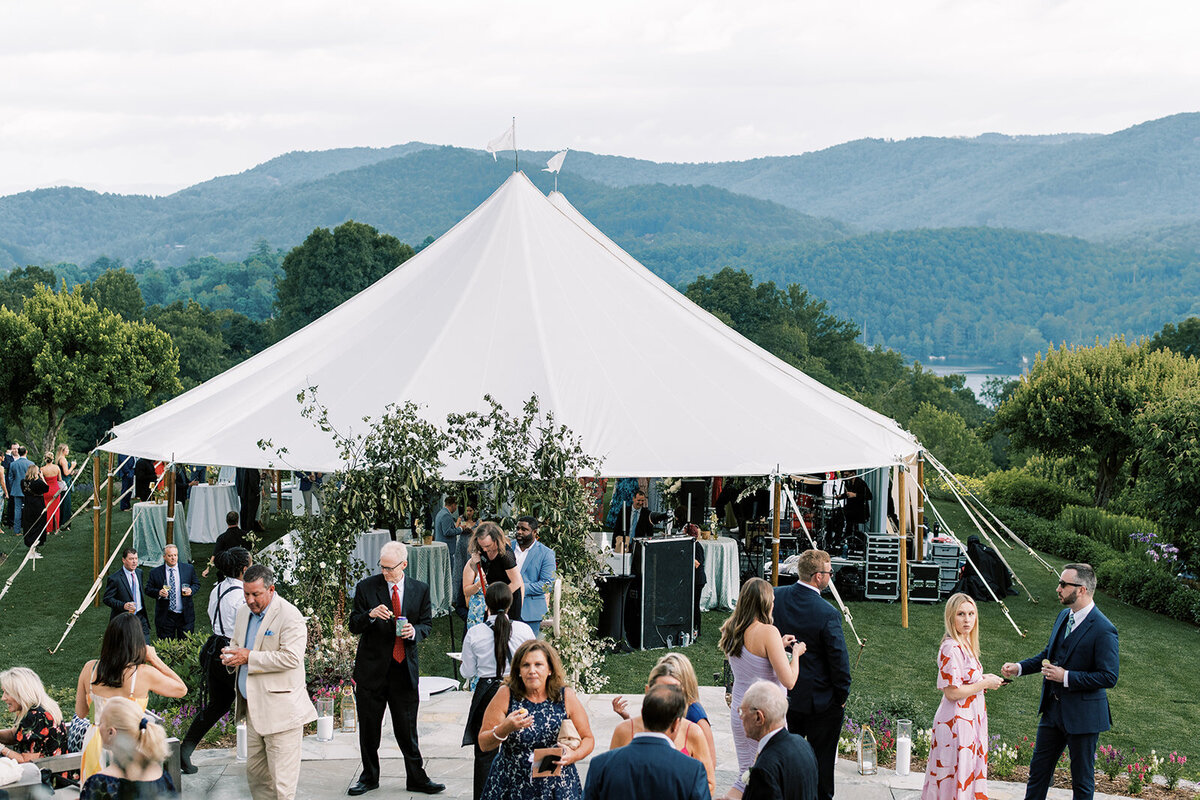 Sailcloth tent wedding reception with mountain views at Trillium Links & Lake Club in Cashiers, North Carolina.
