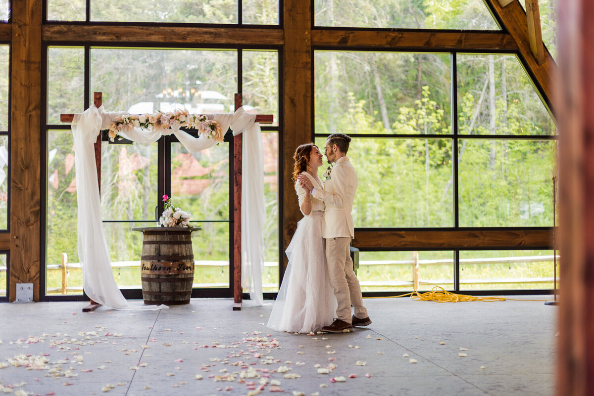 Bride and groom share first dance at their Pine Junction wedding