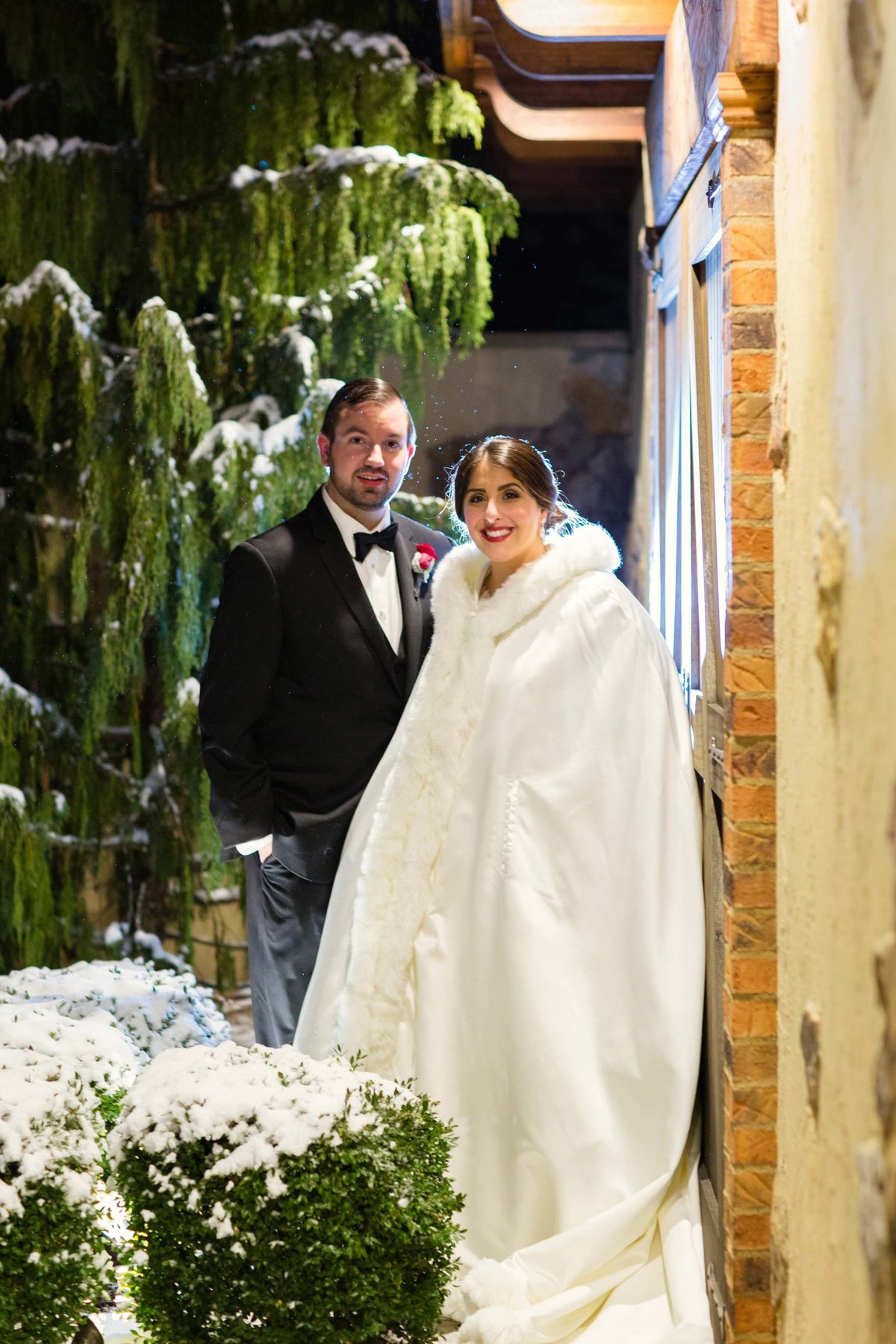 Winter wedding bride and groom outside Larkfield Manor
