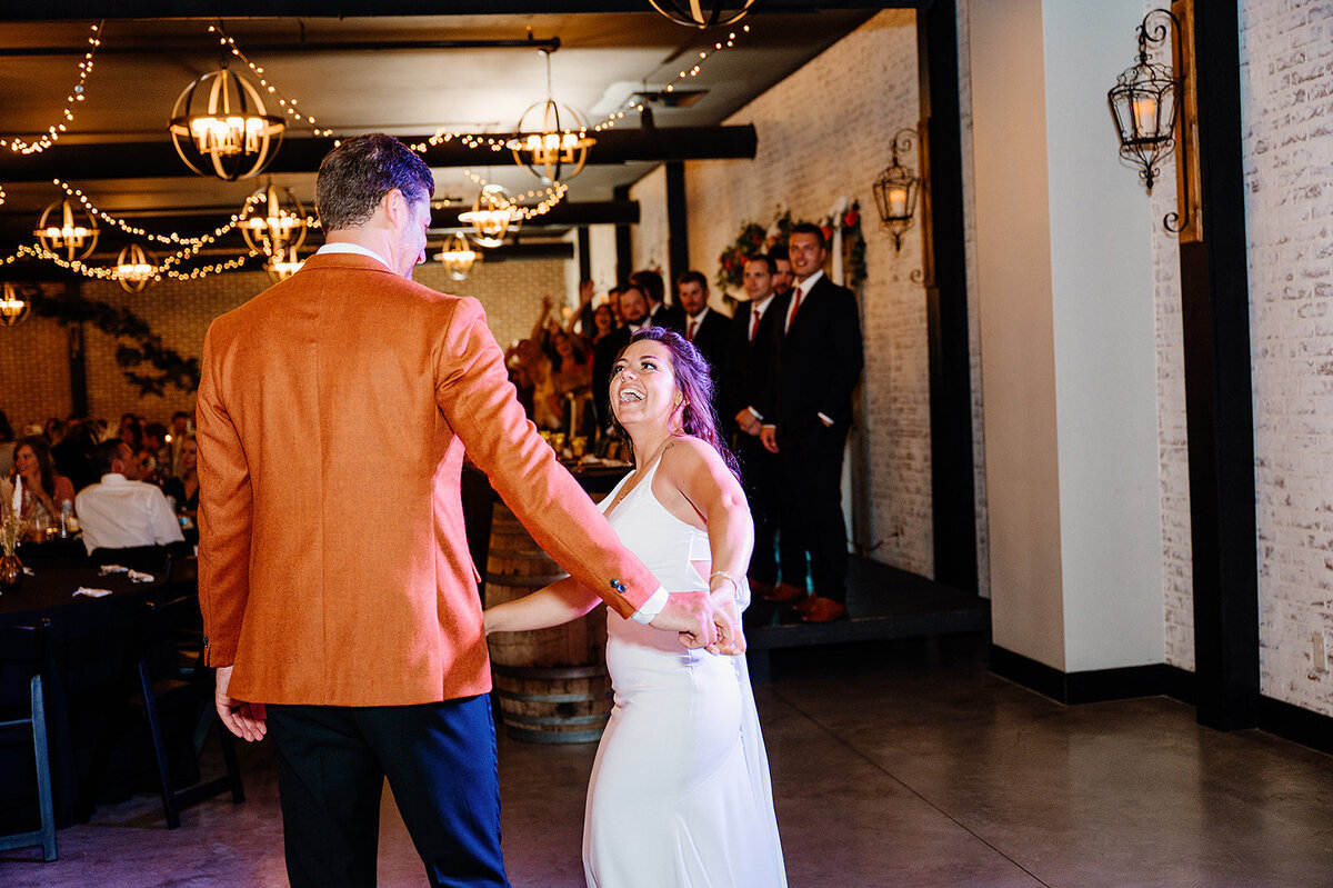 Bride and groom dance together at the Bluebelle Event Venue in Northern MN