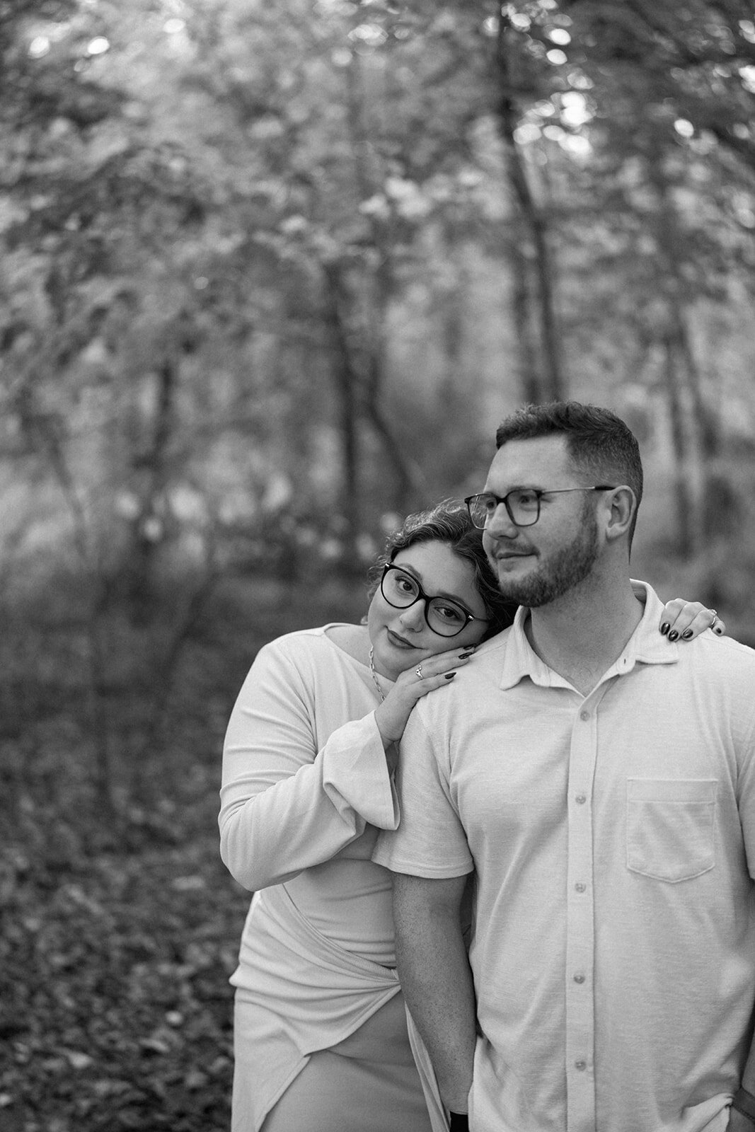 Black and white photo of the couple sharing a warm, intimate moment during their Al Sabo Preserve engagement session.