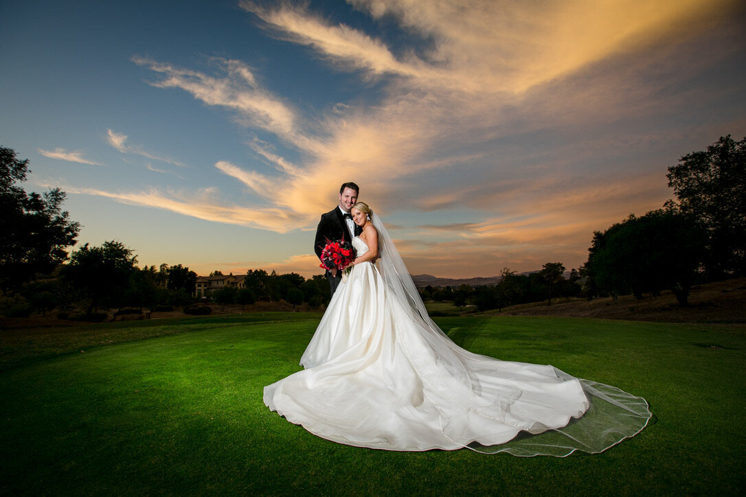 Sunset, golf course, red flowers, sunset photos, ballgown, wedding dress, black velvet tux 