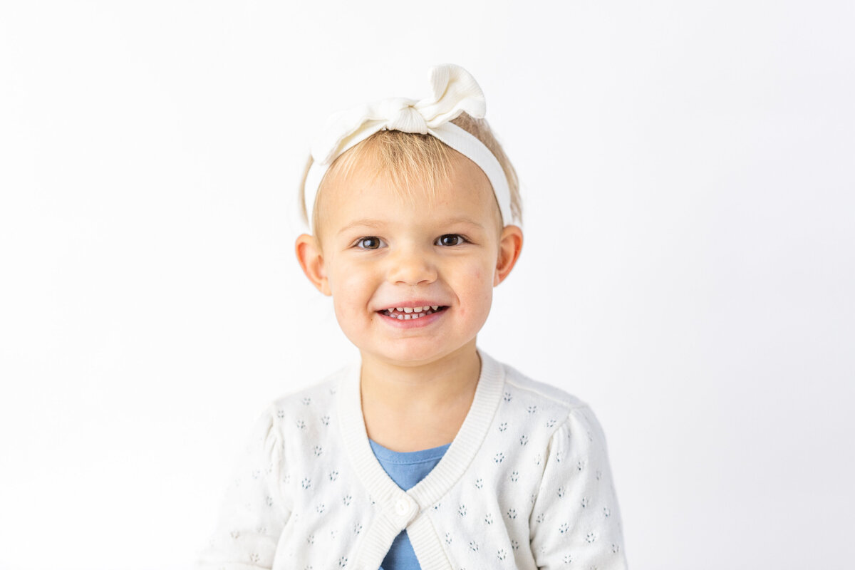 Bright and happy portrait of toddler girl