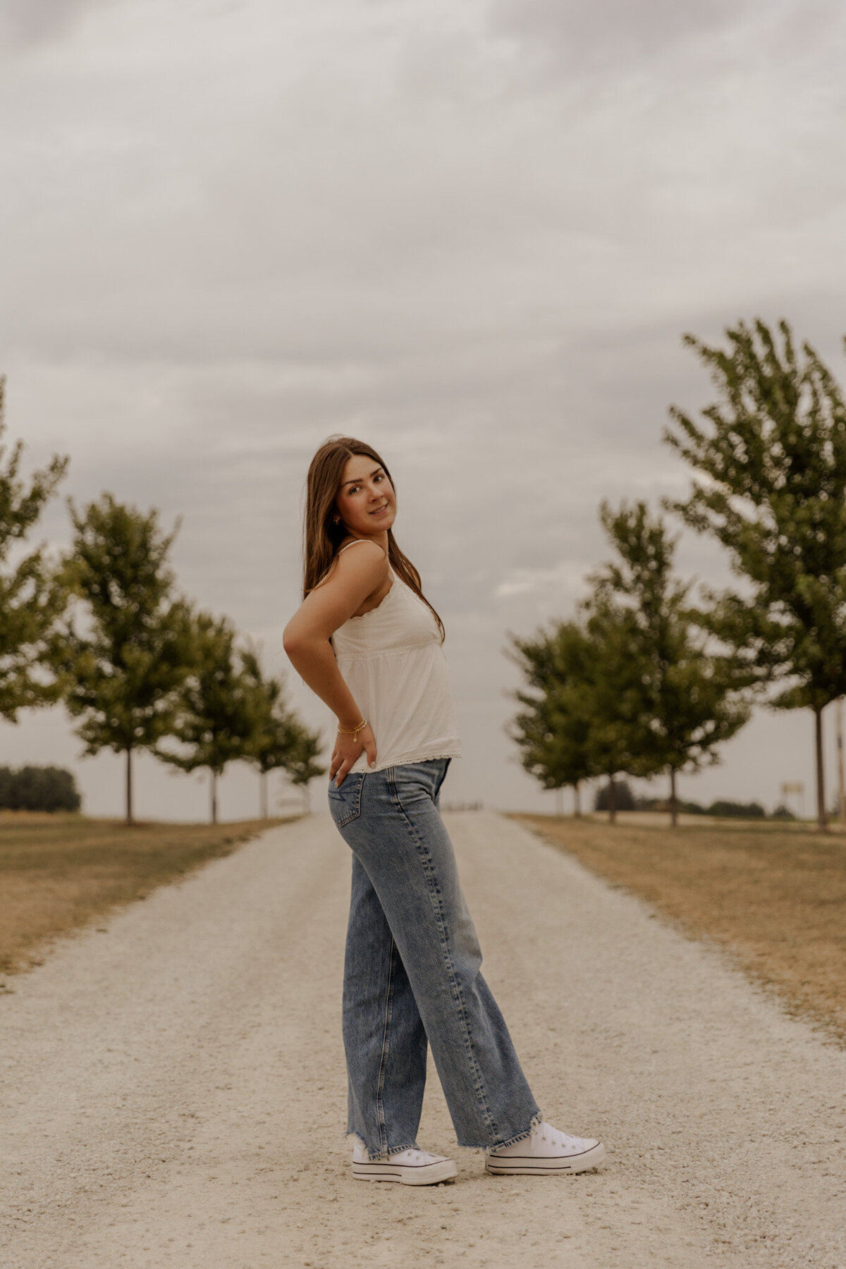 White Shirt and Blue Jeans Senior Photo Outfit in Rochester, Minnesota 