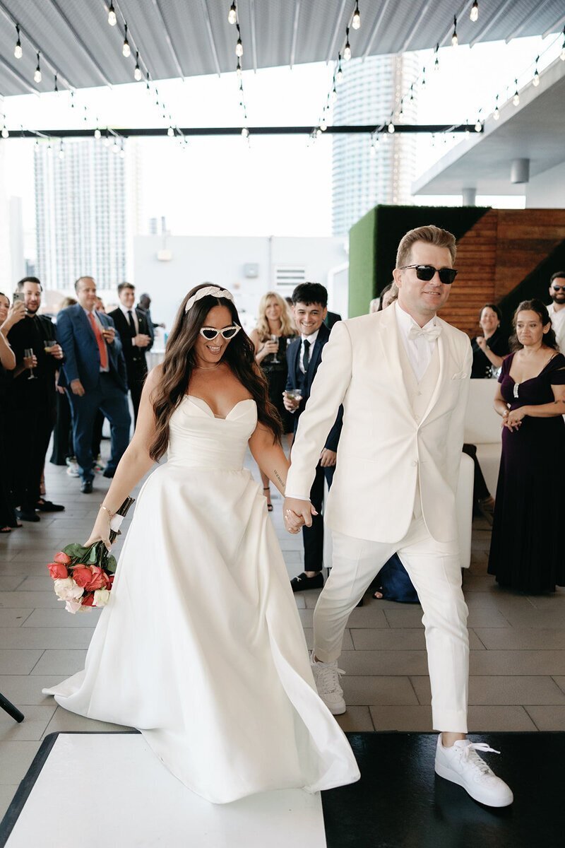 bride and groom reception entrance at the penthouse at riverside wharf​