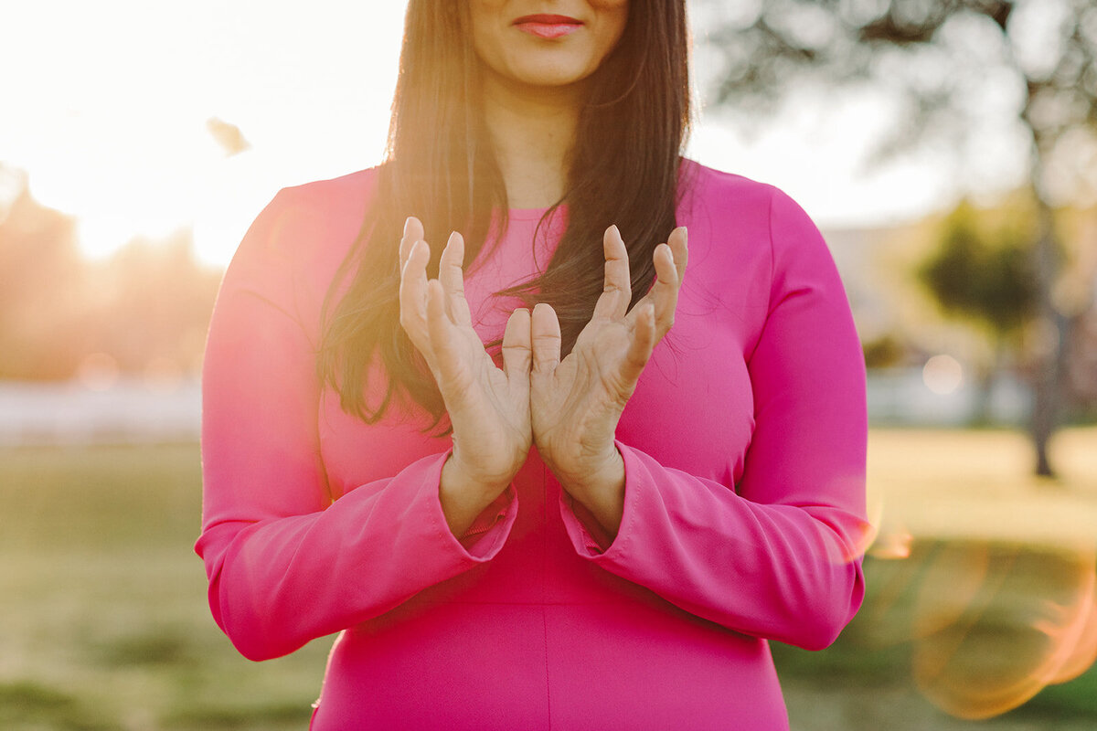 Utah Family Photographer captures brand photoshoot of woman wearing pink outfit