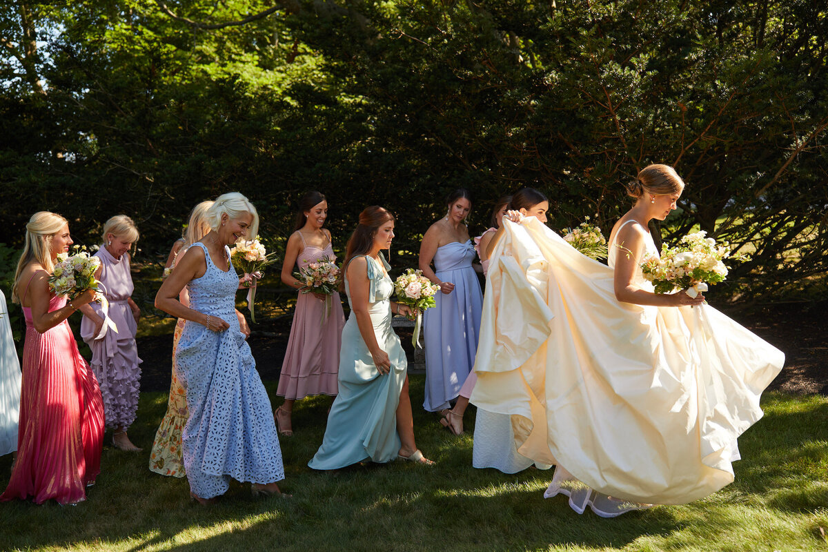 erica-renee-beauty-Newport-castlehillinn-castle-hill-wedding-summer-wedding-RI-southern-belles-multicolored-bridesmaids-bright-dresses-mixed-maids-unmatched-luxury-hair-and-makeup-duo-skin-spirit-cool-classic-chignon-erica-renee-beauty