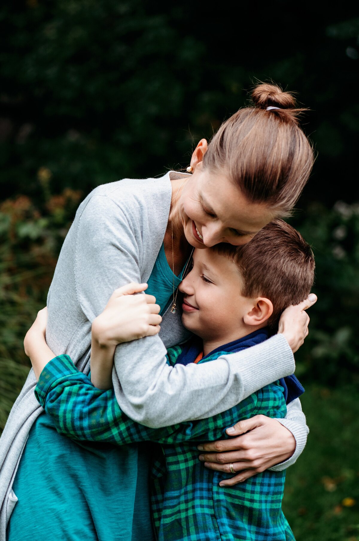 Mom and son hug McKennaPattersonPhotography