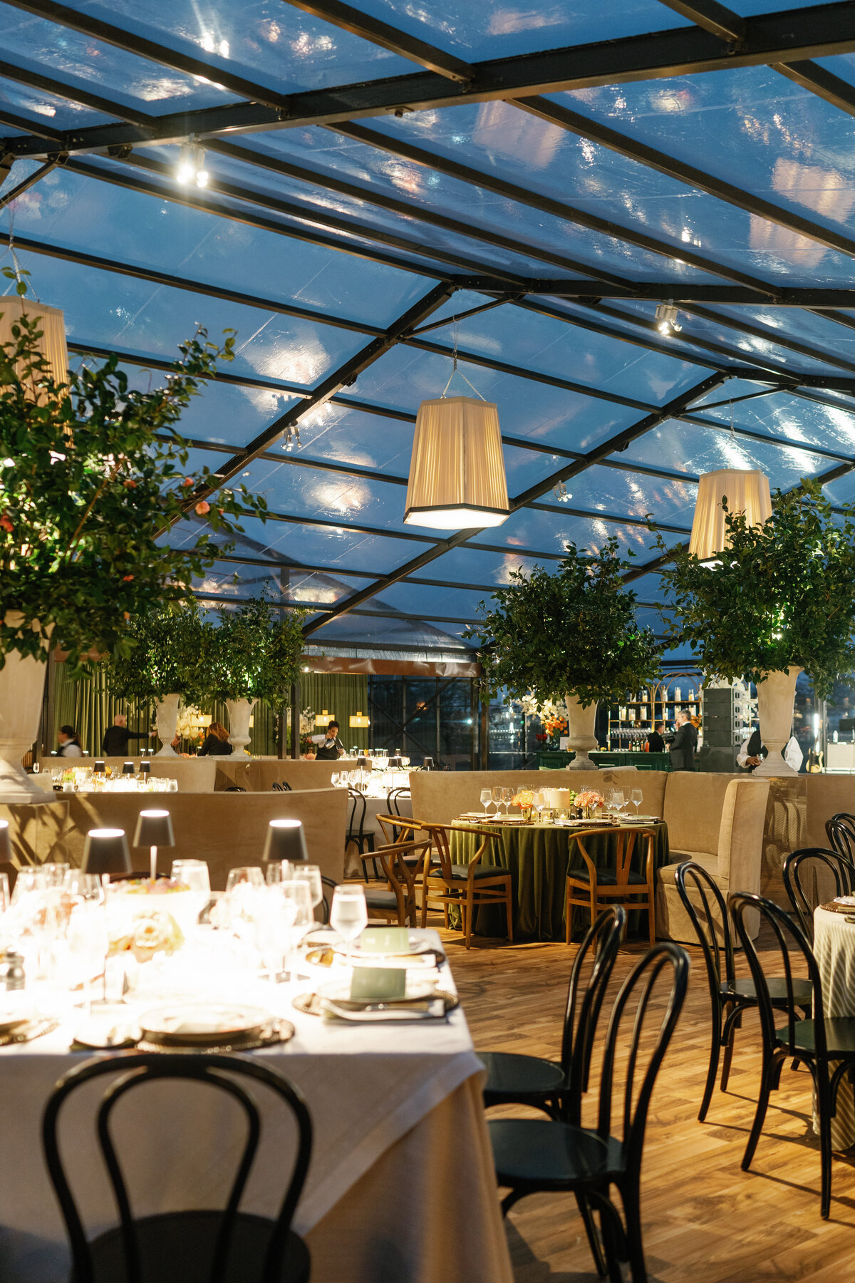 Evening candle lit wedding reception in Dallas with a garden feel